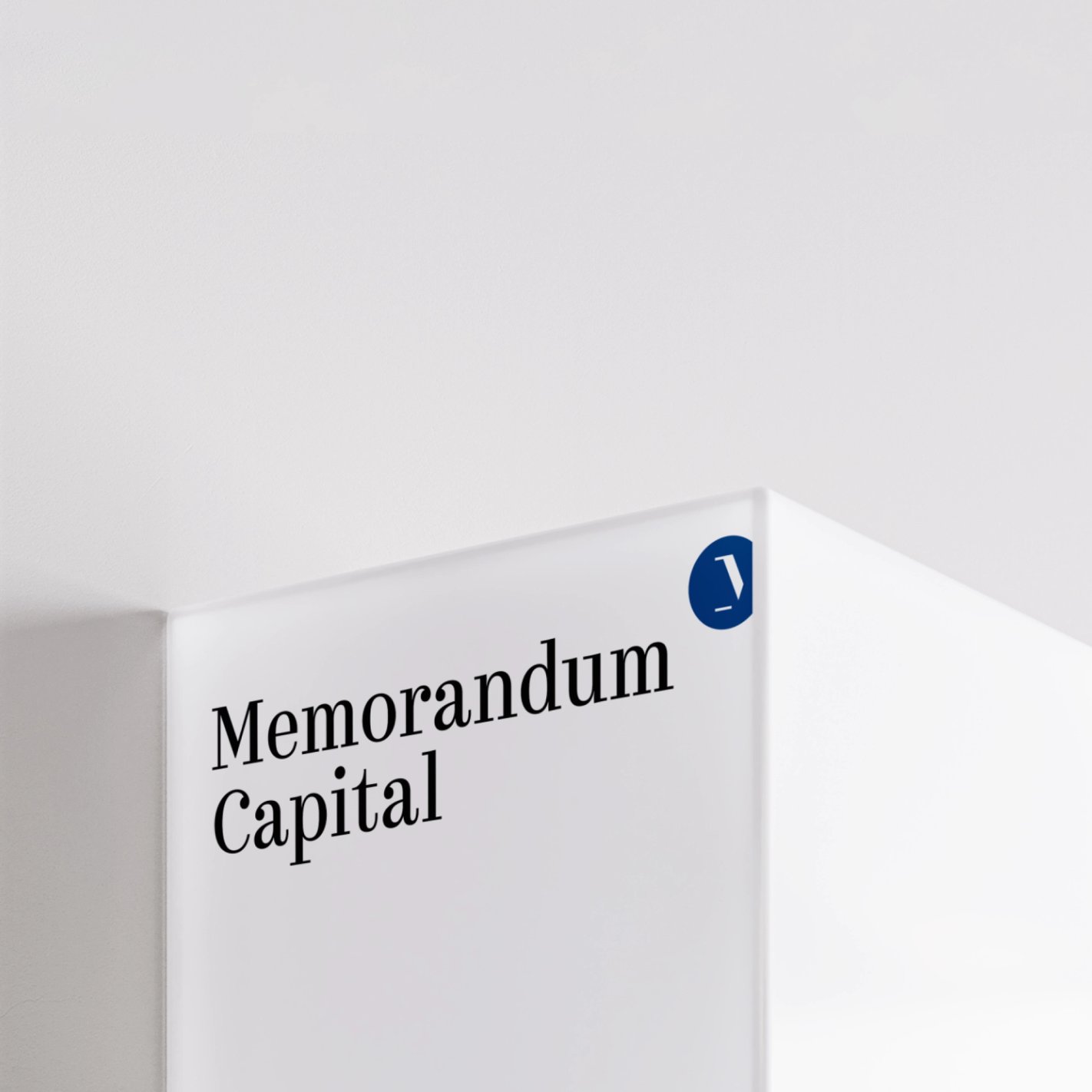 Memorandum Capital logo on a white sign, close-up