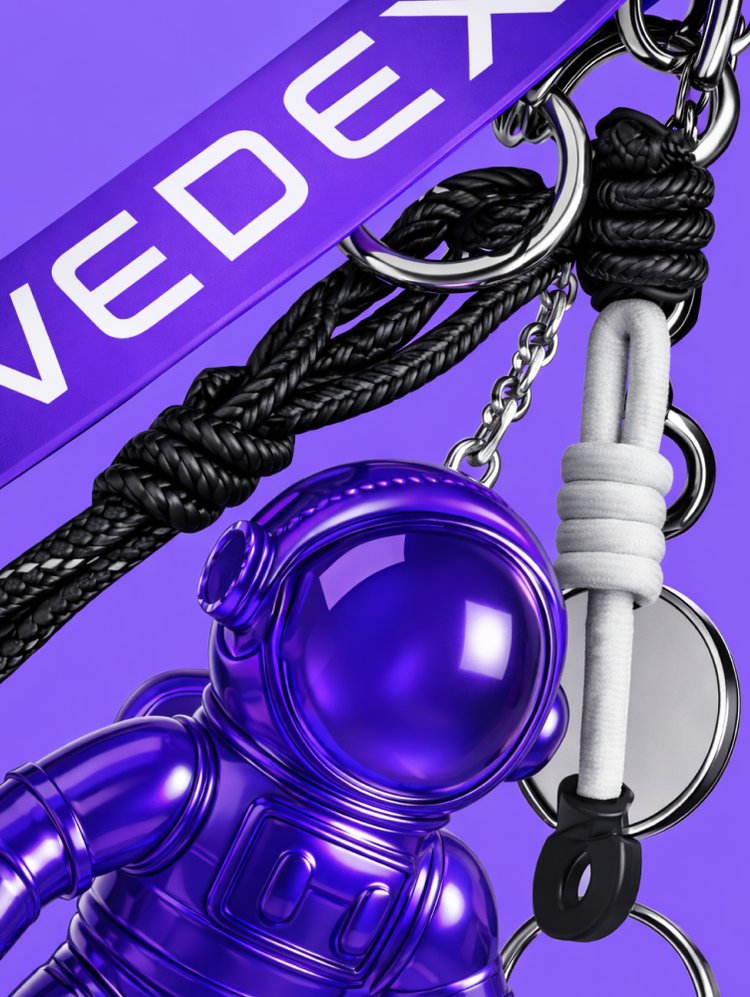 EVEDEX lanyard with a purple astronaut keyring
